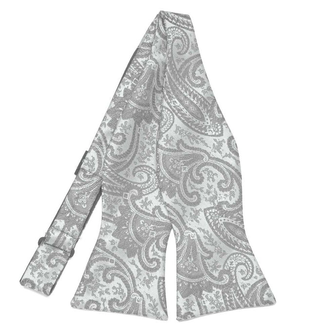 Silver paisley self-tie bow tie, untied flat front view