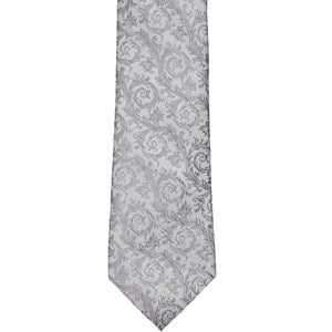 The front of a silver tie with a tone on tone floral pattern