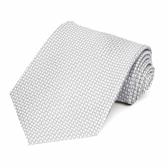 Rolled view of a light gray circle pattern necktie