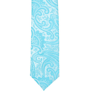The front, bottom tip of a turquoise paisley slim tie