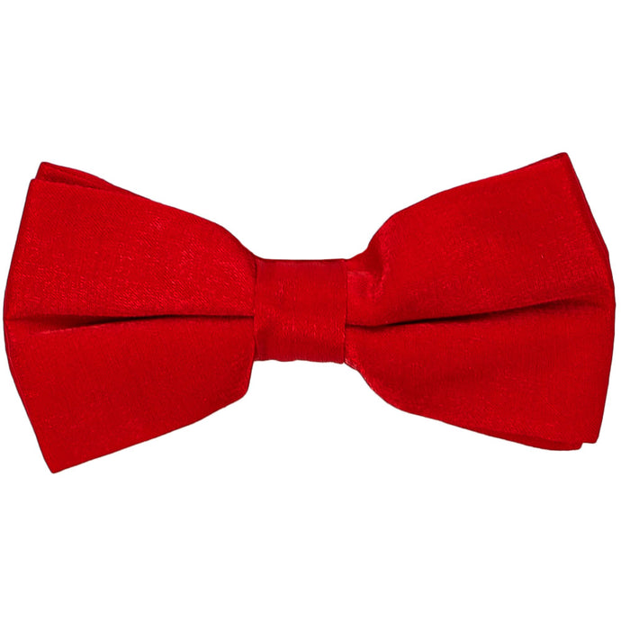 A red pre-tied bow tie in a shimmery fabric