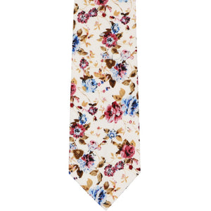 The front of a mauve, blue and tan floral tie, laid out flat