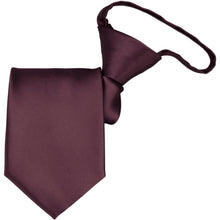 Load image into Gallery viewer, A rolled wine colored zipper tie