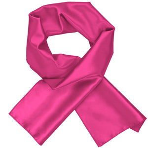 A bright fuchsia women's scarf, crossed over itself