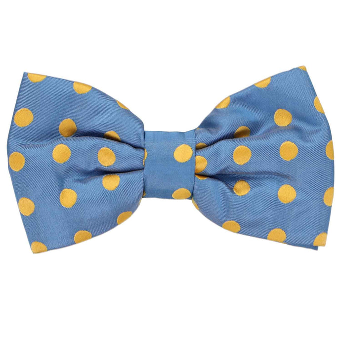A pre-tied medium blue bow tie with contrasting yellow polka dots