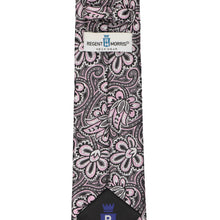 Load image into Gallery viewer, A necktie with a pink and gray swirling floral pattern, featuring a white Regent Morris Neckwear label at the collar and a black tip with a blue and white crest.