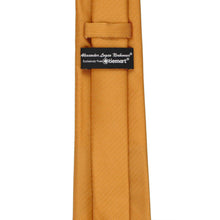 Load image into Gallery viewer, A close-up of an antique gold necktie with a label reading Alexander Logan Neckwear exclusively from TieMart.