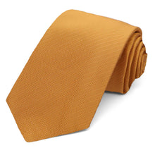 Load image into Gallery viewer, A rolled antique gold necktie with a fine textured herringbone pattern, displayed on a clean white background.