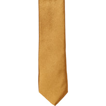 Load image into Gallery viewer, The front of an antique gold skinny tie, laid flat
