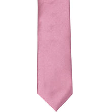 Load image into Gallery viewer, The front of an antique pink slim tie, laid out flat