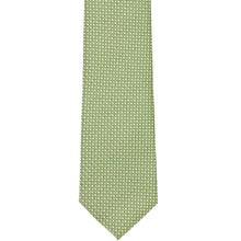Load image into Gallery viewer, The front of an apple green tie with a circle pattern, laid flat