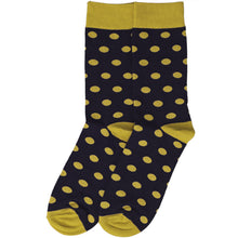 Load image into Gallery viewer, A pair of black socks with a gold polka dot pattern, featuring solid gold cuffs, heels, and toes, displayed against a plain white background.
