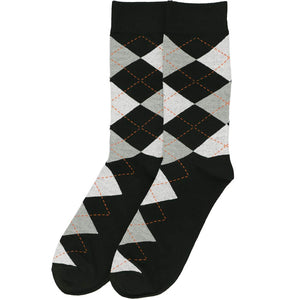 A pair of black and gray argyle socks, laid out flat