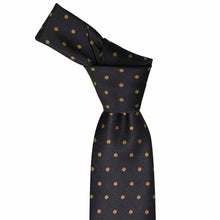 Load image into Gallery viewer, Black and old gold polka dot tie with a knot