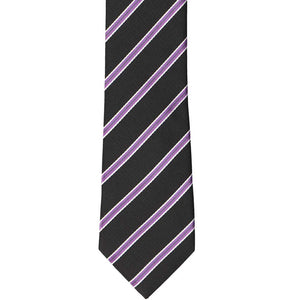 The front of a black tie with purple pencil stripe, laid flat