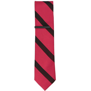 A solid black tie bar on a red and black striped skinny tie