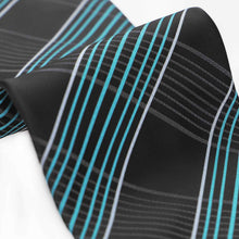 Load image into Gallery viewer, Closeup of a black and turquoise plaid tie to show texture