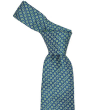 Load image into Gallery viewer, Knot on a blue and green small floral silk tie