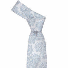 Load image into Gallery viewer, Knot on a blue and white large paisley necktie