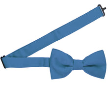 Load image into Gallery viewer, A blue bow tie with an open band collar