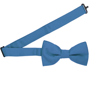 A blue bow tie with an open band collar