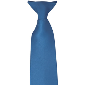 The knot on a blue clip-on tie