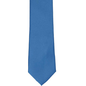 The front of a blue solid slim tie, laid flat