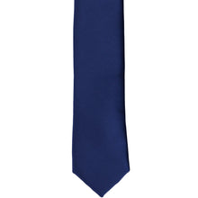Load image into Gallery viewer, The front of a blue velvet skinny tie, laid out flat