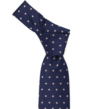 Load image into Gallery viewer, Knotted navy blue tie with blush pink polka dots on a white background