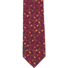 Load image into Gallery viewer, The front of a burgundy boys&#39; tie with a leaf pattern