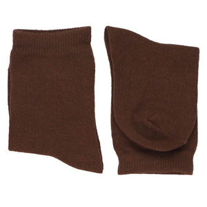 A pair of boys' folded socks in brown