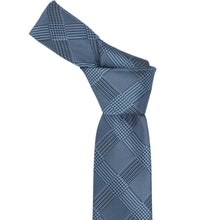 Load image into Gallery viewer, Knot on a boys dark blue michael glen plaid tie