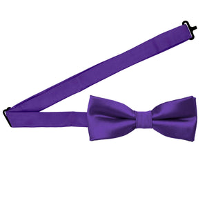 A boys' pre-tied dark purple bow tie with the collar open