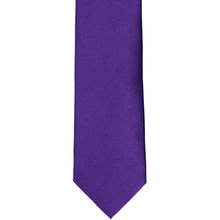 Load image into Gallery viewer, The front of a boys&#39; dark purple tie, laid out flat