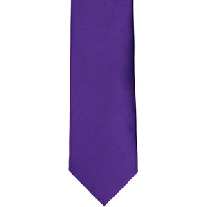 The front of a boys' dark purple tie, laid out flat