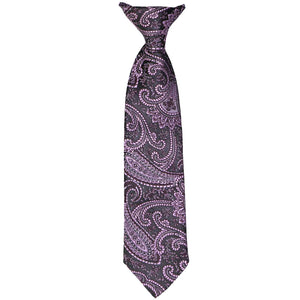 A kids-sized eggplant purple paisley clip-on tie, laid out flat