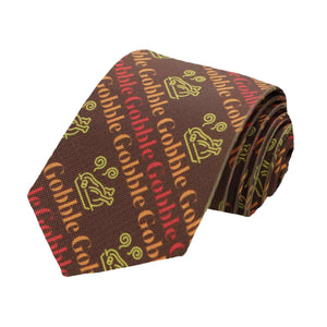 A boys' brown Thanksgiving tie with striped cooked turkeys and gobble text