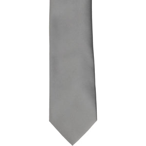 The front of a gray boys' tie