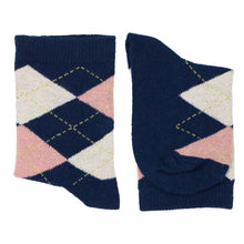 Load image into Gallery viewer,  A pair of boys blush pink and navy blue argyle socks, folded