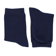 Load image into Gallery viewer, A pair of boys&#39; navy blue socks, folded over