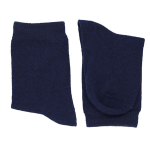 A pair of boys' navy blue socks, folded over