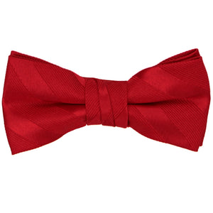A child-size red bow tie with tone on tone stripes