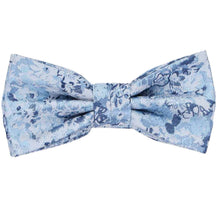 Load image into Gallery viewer, A child-size light blue and white patterned bow tie with a subtle floral texture