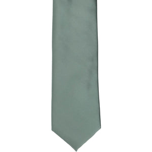 The front of a boys stormy gray tie, laid out flat