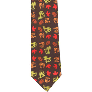 The front of a boys' brown tie with an all over Thanksgiving theme