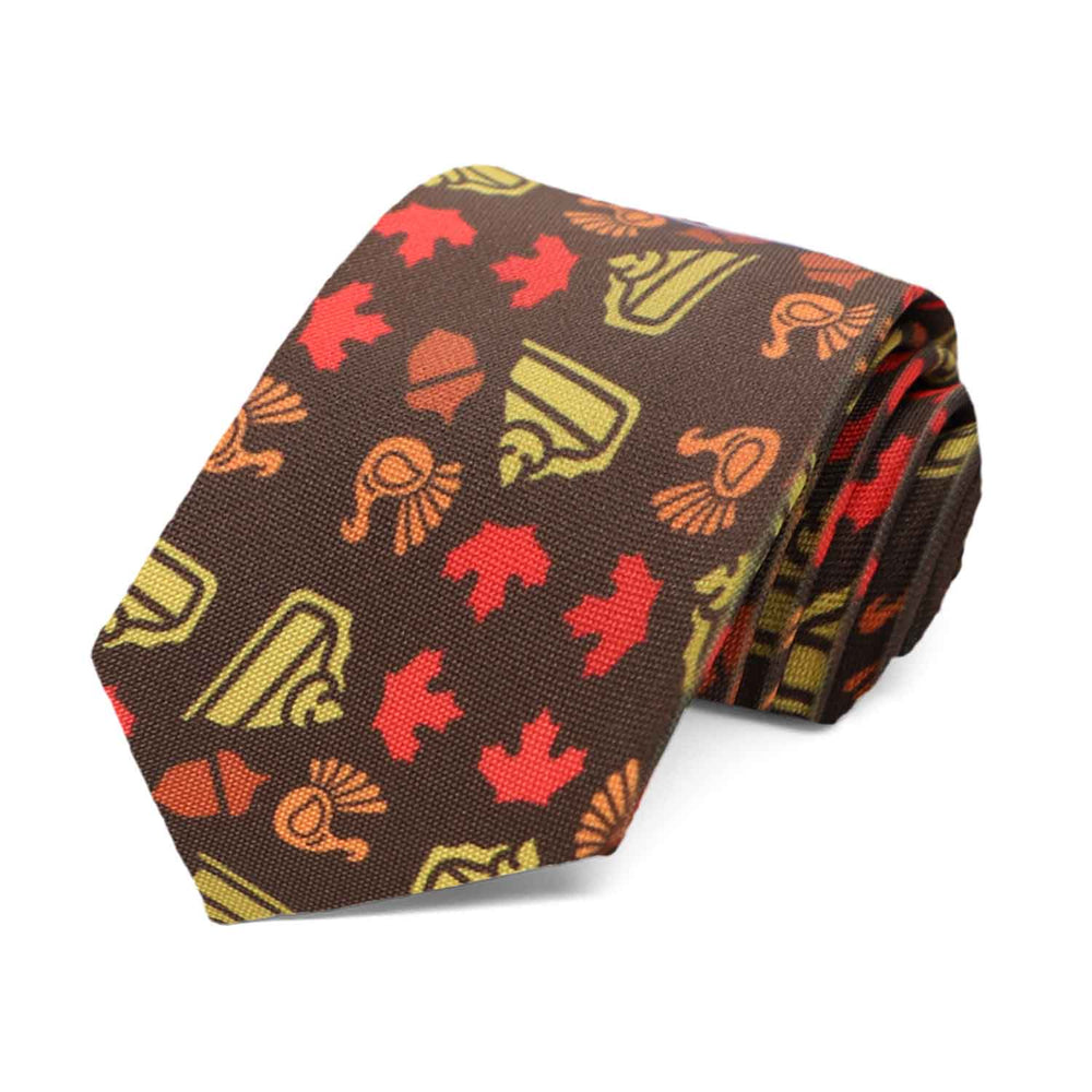 A boys' brown tie that's covered in a Thanksgiving pattern