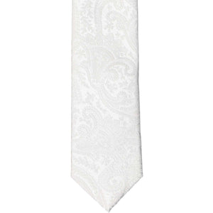 The front of a boys white paisley necktie