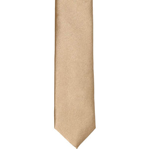 The front of a bronze skinny tie, laid flat