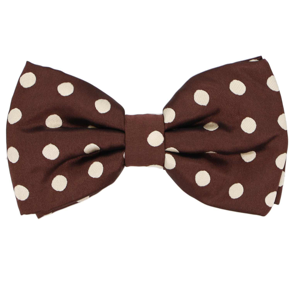 A brown pre-tied bow tie with medium-sized tan polka dots