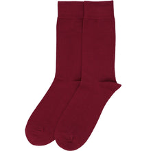Load image into Gallery viewer, A pair of solid burgundy men&#39;s socks, laid out flat